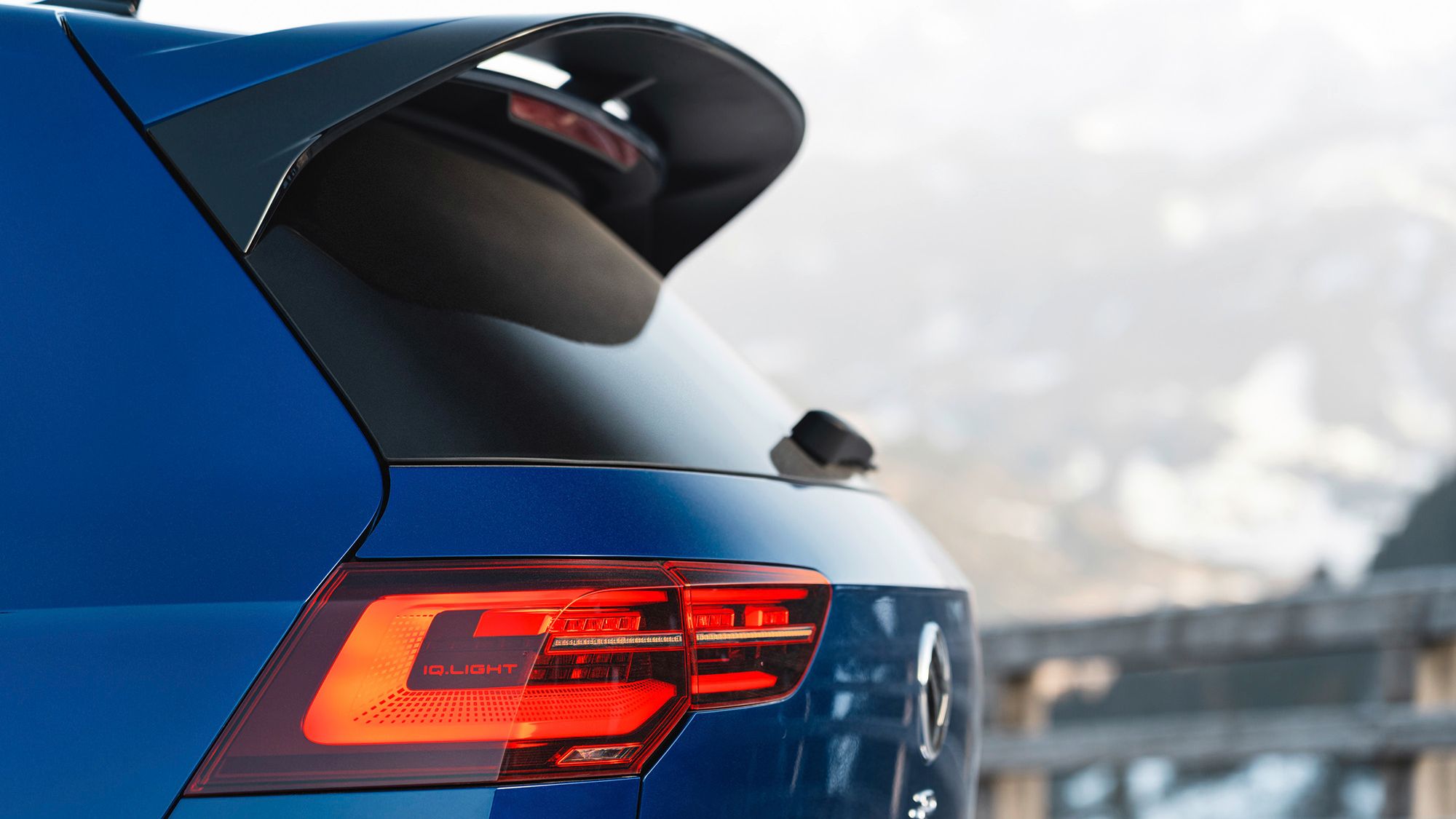 Rear side view of a blue Volkswagen Golf R